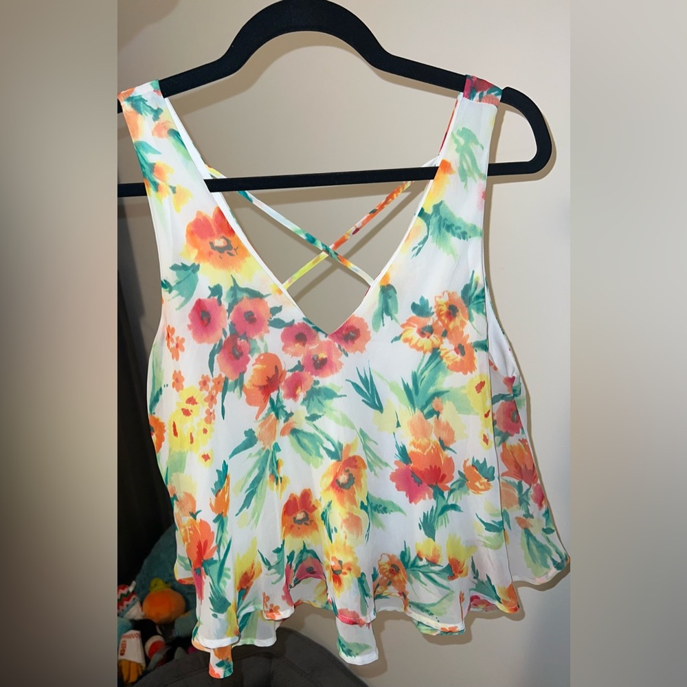 PRICE DROP Brand Lush Floral flowy crop top with crisscross straps in back.